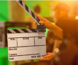 close-up-shot-on-film-studio-set-young-camera-assistant-holds-empty-picture-id1265157303